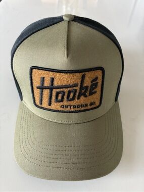 Hooké Fly Patch trucker hat olive green canvas front with a black mesh back.